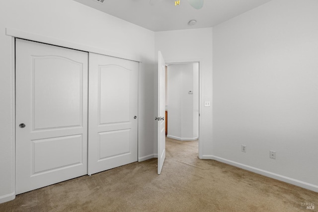 1049 Villaggio Cir, Vacaville, CA 95688 - unfurnished bedroom featuring light carpet, a closet, and baseboards