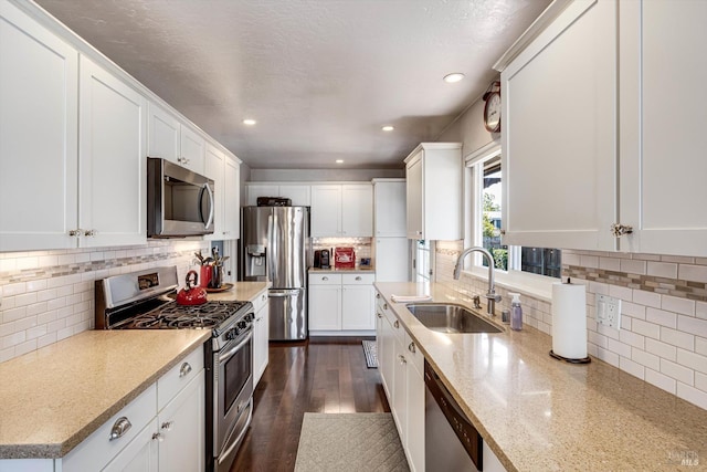 1805 Central Ave, Napa, CA 94558 - kitchen featuring stainless steel appliances, a sink, decorative backsplash, white cabinetry, and recessed lighting