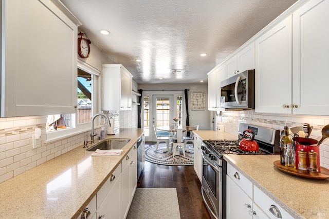 1805 Central Ave, Napa, CA 94558 - kitchen featuring appliances with stainless steel finishes, a sink, healthy amount of natural light, tasteful backsplash, and recessed lighting