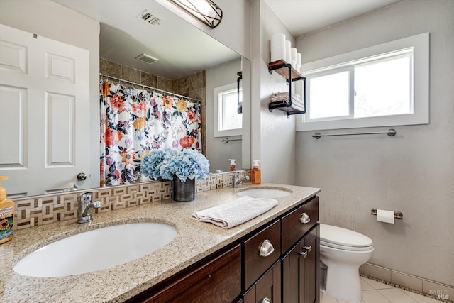 1805 Central Ave, Napa, CA 94558 - full bath featuring toilet, tile patterned flooring, double vanity, a shower with shower curtain, and backsplash