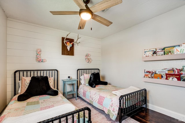 1805 Central Ave, Napa, CA 94558 - bedroom with wood finished floors, baseboards, wood walls, and ceiling fan