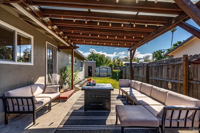 1805 Central Ave, Napa, CA 94558 - view of patio with an outdoor living space, a storage shed, a fenced backyard, and an outbuilding