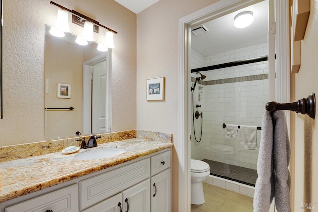 226 Usher Dr, Windsor, CA 95492 - full bathroom with toilet, a shower stall, vanity, tile patterned flooring, and a textured wall