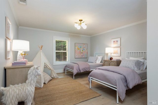 711 Furlong Rd, Sebastopol, CA 95472 - bedroom with crown molding, a chandelier, wood finished floors, and baseboards