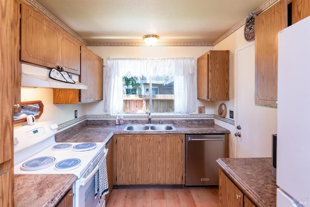 1444 Gold Way, Rohnert Park, CA 94928 - kitchen featuring white appliances, under cabinet range hood, a sink, and dark countertops