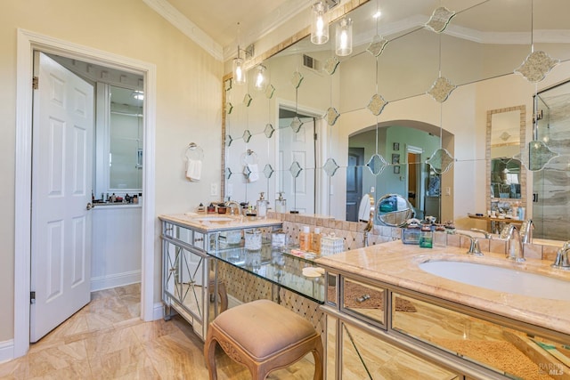 bathroom featuring ornamental molding, marble finish flooring, double vanity, vaulted ceiling, and an enclosed shower