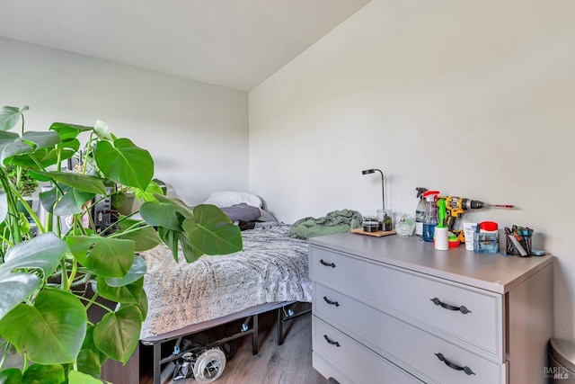 bedroom with light wood-style floors