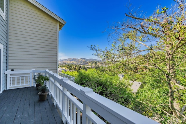 balcony featuring a mountain view