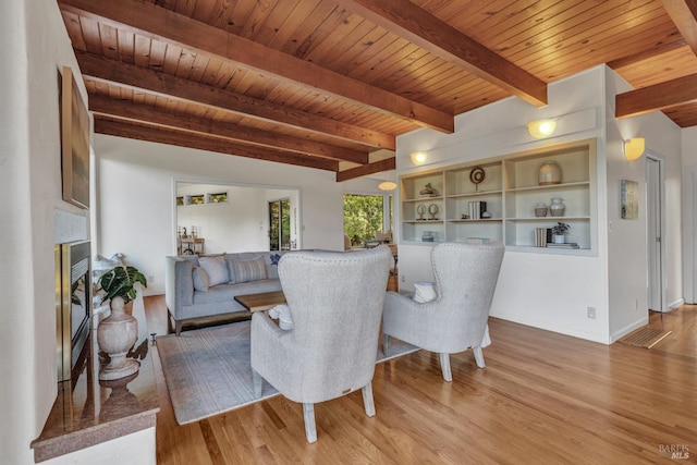 4444 Redwood Rd, Napa, CA 94558 - living area featuring light wood-type flooring, wooden ceiling, beam ceiling, and a glass covered fireplace