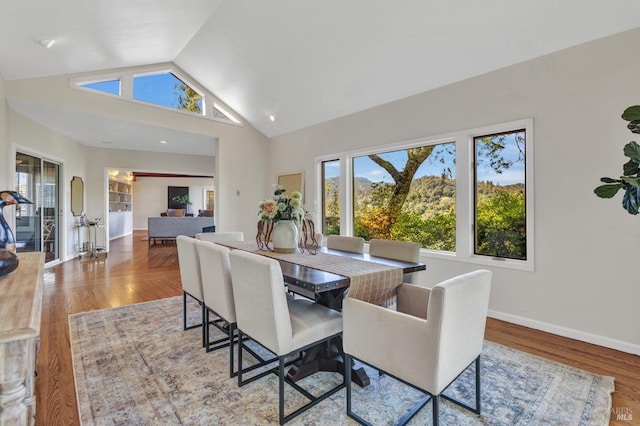 4444 Redwood Rd, Napa, CA 94558 - dining space with healthy amount of natural light, high vaulted ceiling, wood finished floors, and baseboards