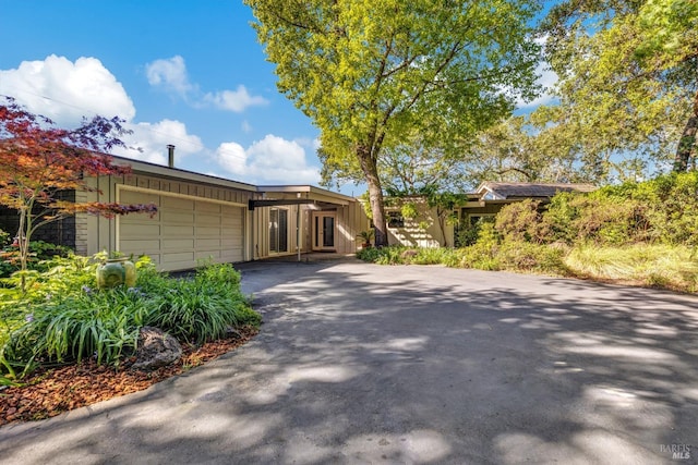 4444 Redwood Rd, Napa, CA 94558 - view of front of home featuring asphalt driveway and a garage