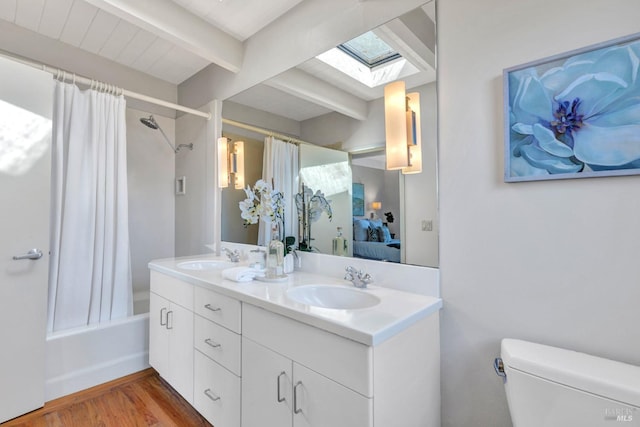 4444 Redwood Rd, Napa, CA 94558 - ensuite bathroom with a skylight, beamed ceiling, wood finished floors, toilet, and shower / bathtub combination with curtain