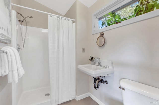4444 Redwood Rd, Napa, CA 94558 - full bathroom featuring a shower stall, toilet, baseboards, and vaulted ceiling
