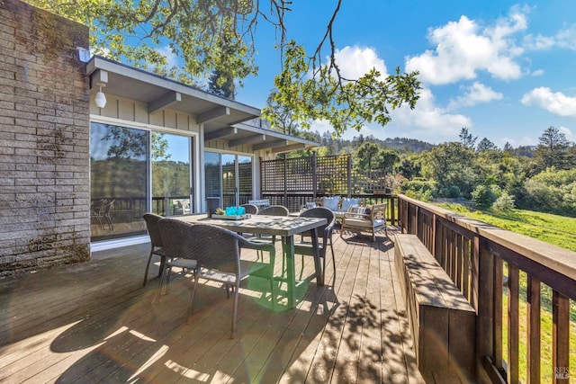4444 Redwood Rd, Napa, CA 94558 - deck with outdoor dining area and a wooded view