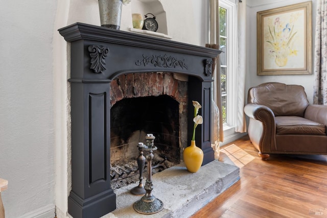 32 Muller St, Vallejo, CA 94590 - detailed view of a fireplace with raised hearth, wood finished floors, and a textured wall