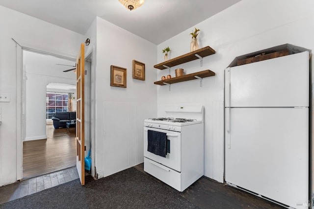 32 Muller St, Vallejo, CA 94590 - kitchen with white appliances, dark wood-type flooring, open shelves, and arched walkways