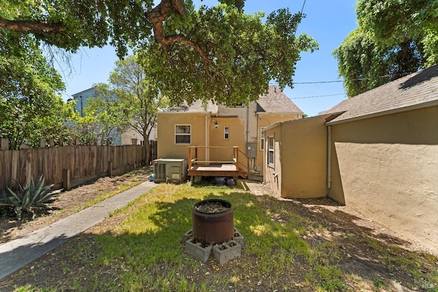 32 Muller St, Vallejo, CA 94590 - view of yard featuring a wooden deck and central air condition unit