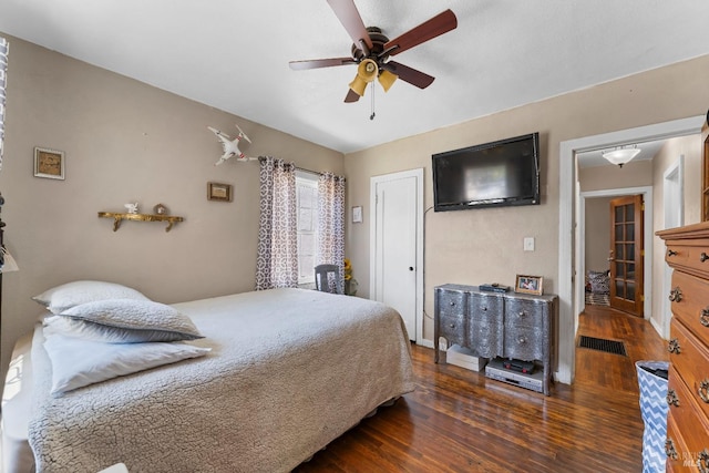 32 Muller St, Vallejo, CA 94590 - bedroom with dark wood-type flooring, ceiling fan, and baseboards