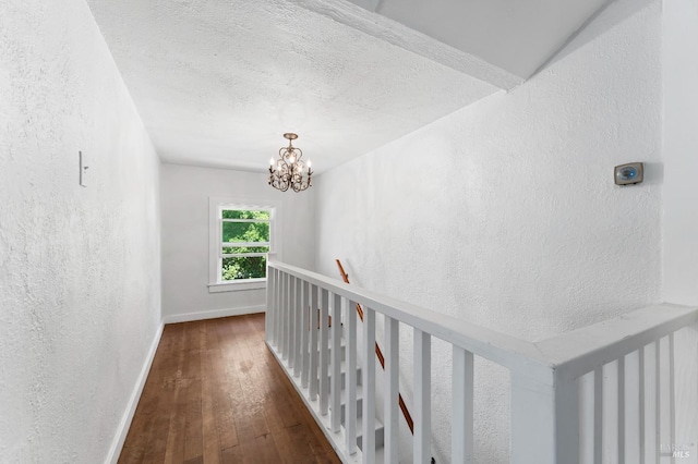 32 Muller St, Vallejo, CA 94590 - hall featuring baseboards, dark wood-style floors, a textured wall, a chandelier, and a textured ceiling