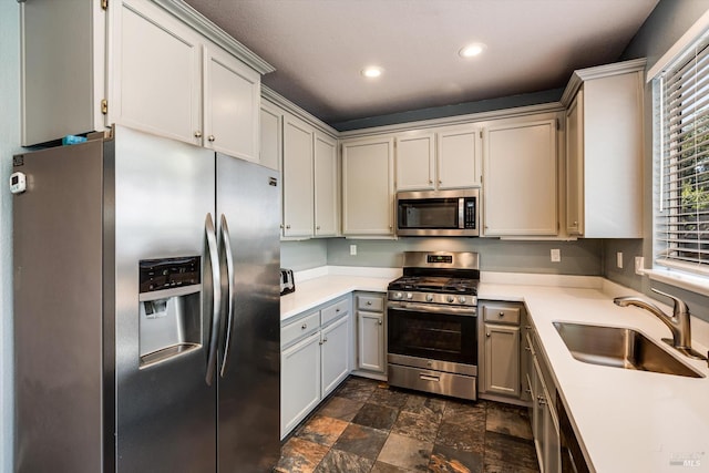 9227 Berwyn Way, Windsor, CA 95492 - kitchen with appliances with stainless steel finishes, a sink, recessed lighting, stone finish floors, and light countertops