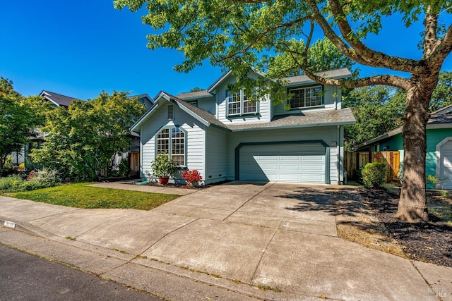 9227 Berwyn Way, Windsor, CA 95492 - traditional home featuring a garage, driveway, a shingled roof, and fence