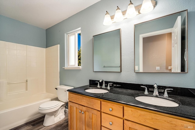 9227 Berwyn Way, Windsor, CA 95492 - bathroom featuring wood finished floors, toilet, and double vanity