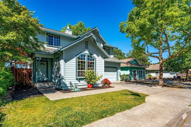 9227 Berwyn Way, Windsor, CA 95492 - traditional home featuring concrete driveway, a garage, and a chimney