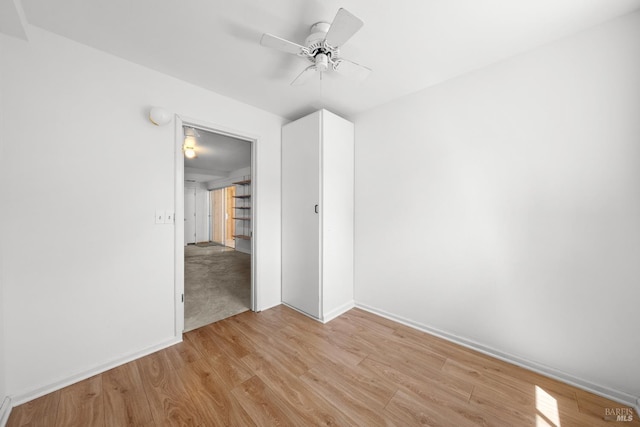 17651 Van Arsdale Rd, Potter Valley, CA 95469 - empty room with a ceiling fan, light wood-style flooring, and baseboards