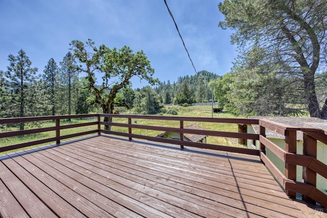 17651 Van Arsdale Rd, Potter Valley, CA 95469 - wooden terrace featuring a wooded view