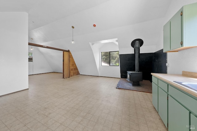 17651 Van Arsdale Rd, Potter Valley, CA 95469 - additional living space featuring light floors, a wood stove, lofted ceiling, and a sink