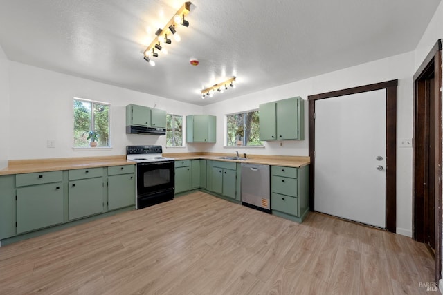 17651 Van Arsdale Rd, Potter Valley, CA 95469 - kitchen featuring range with electric stovetop, stainless steel dishwasher, under cabinet range hood, green cabinets, and a textured ceiling