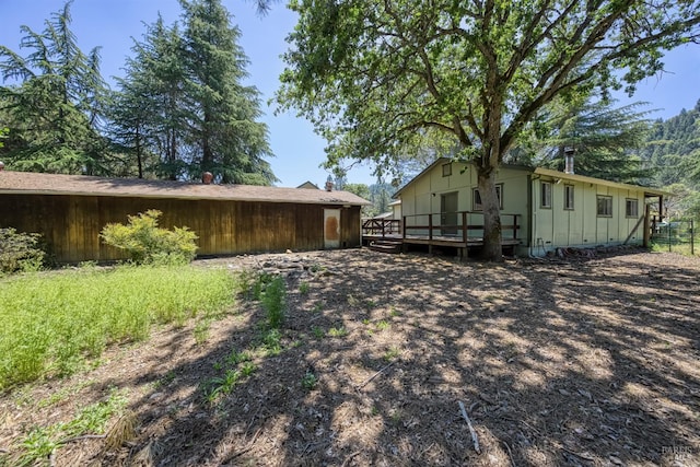 17651 Van Arsdale Rd, Potter Valley, CA 95469 - view of property exterior featuring a wooden deck and board and batten siding