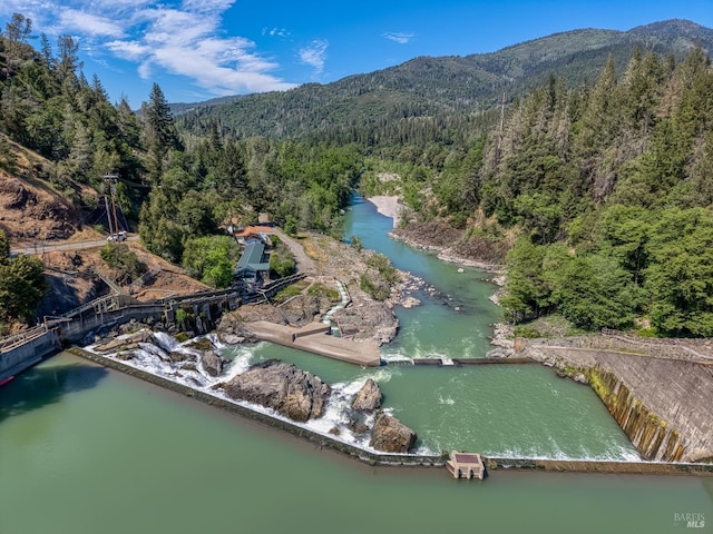 17651 Van Arsdale Rd, Potter Valley, CA 95469 - aerial overview of property's location with a heavily wooded area and a water and mountain view