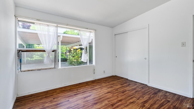 375 Las Colindas Rd, San Rafael, CA 94903 - unfurnished bedroom with wood finished floors, vaulted ceiling, and a closet