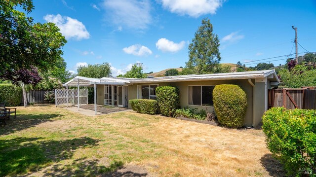 375 Las Colindas Rd, San Rafael, CA 94903 - rear view of property featuring stucco siding and a patio area