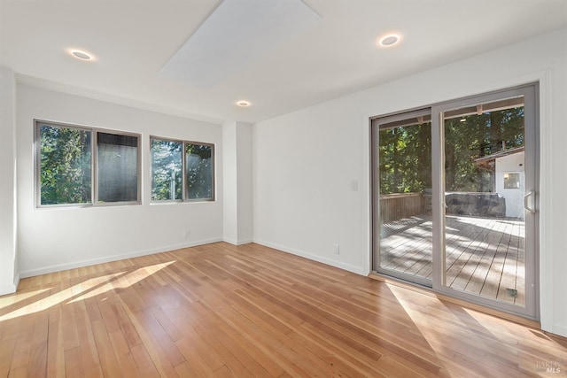 17075 Fitzpatrick Ln, Occidental, CA 95465 - empty room featuring light wood finished floors, baseboards, and recessed lighting