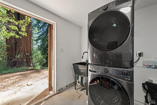 17075 Fitzpatrick Ln, Occidental, CA 95465 - laundry room with stacked washer and clothes dryer