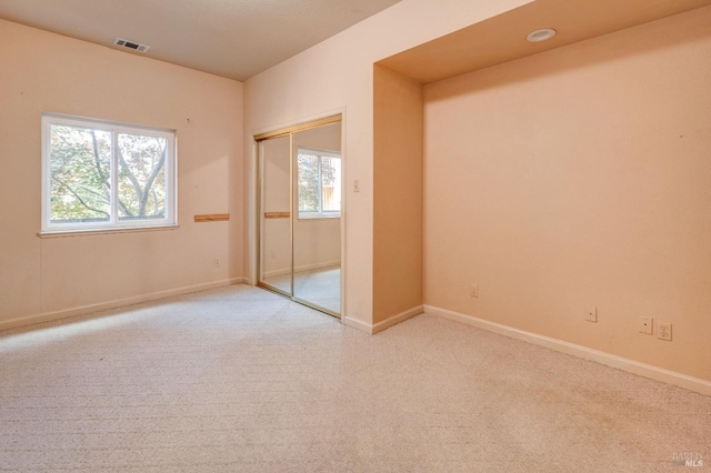 32 Romine Way, Vallejo, CA 94591 - unfurnished bedroom featuring light carpet, baseboards, and a closet