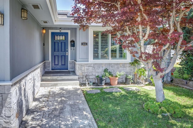 32 Romine Way, Vallejo, CA 94591 - view of exterior entry featuring stone siding and a lawn