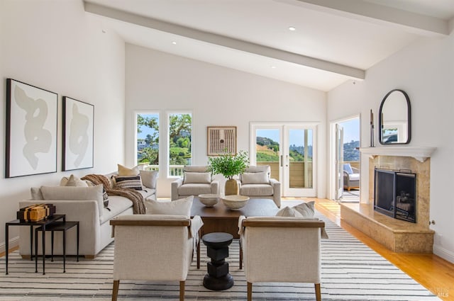 91 Round Hill Rd, Tiburon, CA 94920 - living area featuring beamed ceiling, a fireplace, light wood-type flooring, baseboards, and high vaulted ceiling