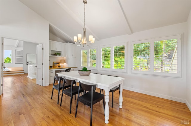 91 Round Hill Rd, Tiburon, CA 94920 - dining room featuring a chandelier, lofted ceiling, baseboards, and light wood-type flooring