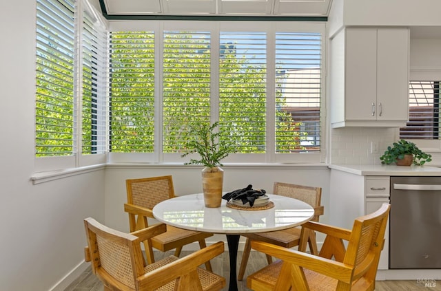44 Lagoon Vis, Tiburon, CA 94920 - dining space featuring healthy amount of natural light, light wood-style flooring, and baseboards
