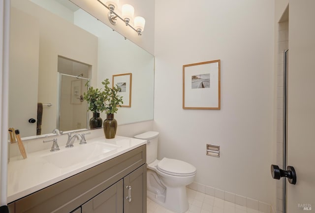 44 Lagoon Vis, Tiburon, CA 94920 - bathroom featuring a shower with door, toilet, baseboards, vanity, and tile patterned floors