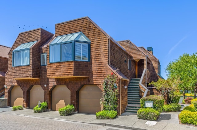 44 Lagoon Vis, Tiburon, CA 94920 - view of front facade featuring an attached garage and stairway