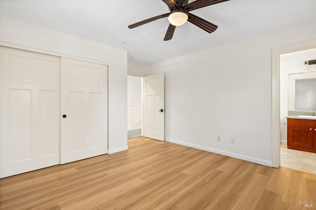 58 Randolph St, Napa, CA 94559 - unfurnished bedroom with light wood-style flooring, a closet, a sink, ensuite bath, and baseboards