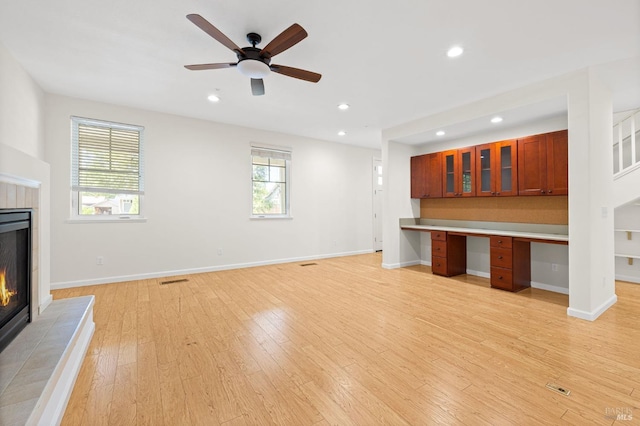 58 Randolph St, Napa, CA 94559 - unfurnished living room with a fireplace, light wood finished floors, recessed lighting, a ceiling fan, and baseboards