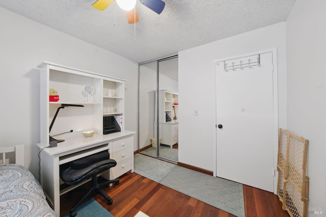 4214 Saturn Way, Union City, CA 94587 - bedroom with dark wood-style flooring, a textured ceiling, ceiling fan, and a desk