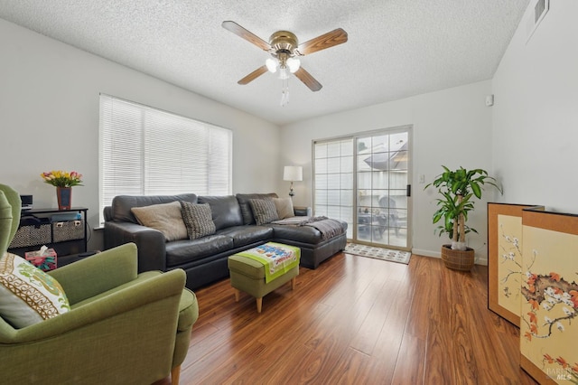 4214 Saturn Way, Union City, CA 94587 - living room featuring a ceiling fan, wood finished floors, a textured ceiling, and baseboards