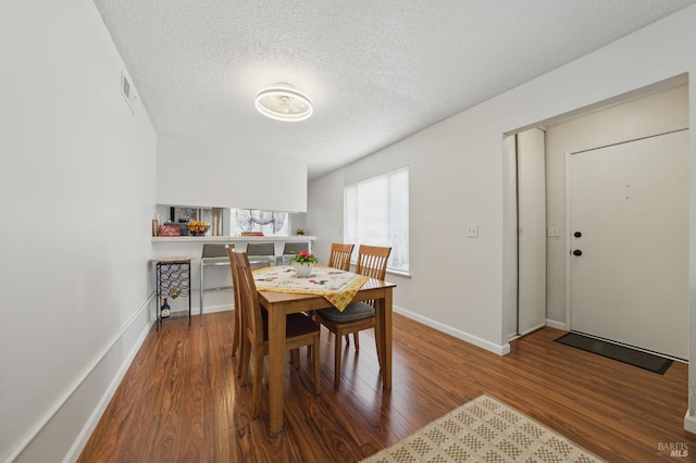 4214 Saturn Way, Union City, CA 94587 - dining room with wood finished floors, baseboards, and a textured ceiling