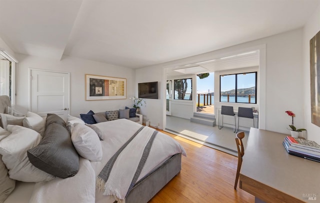 419 Golden Gate Ave, Belvedere, CA 94920 - bedroom with light wood-style flooring and access to outside